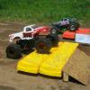 Returning to R/C monster truck racing is Dan Mead drving Pitbull. Dan last recently competed on the RCMTRA circuit around 2004 and hosted the very first RCMTC-NY race at his home track Sharkey's R/C Speedway in 2009. Dan ran his original name and paint scheme on a new ZRP diablo chassis 