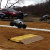 door to door and airbone over the second jump. The drivers would fight to get their trucks back onto the sand as quick and smooth as they can and hammer it for the third and final jump and the finish line.