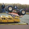Equalizer's run ended when the truck flipped over backwards and landed on it's roof on to of the bus pit
