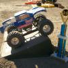 Bigfoot with the 3rd place racing trophy